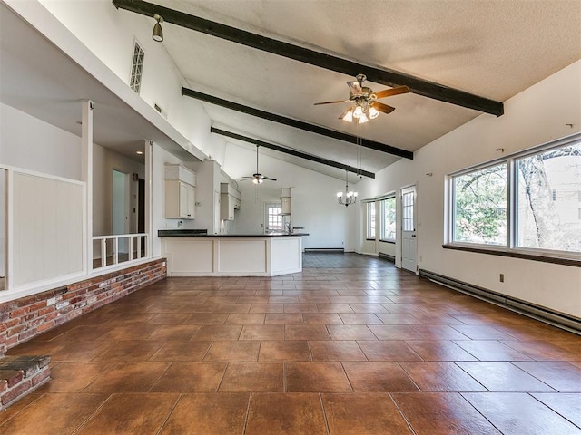 unfurnished living room featuring lofted ceiling with beams, ceiling fan with notable chandelier, baseboard heating, and a textured ceiling