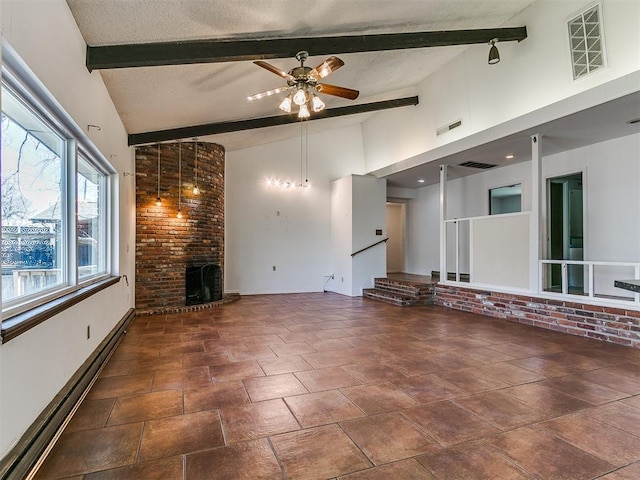 unfurnished living room featuring visible vents, beam ceiling, baseboard heating, a fireplace, and a ceiling fan