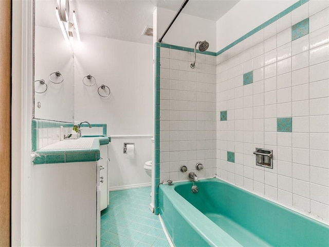 full bathroom with vanity, bathing tub / shower combination, toilet, and tile patterned floors