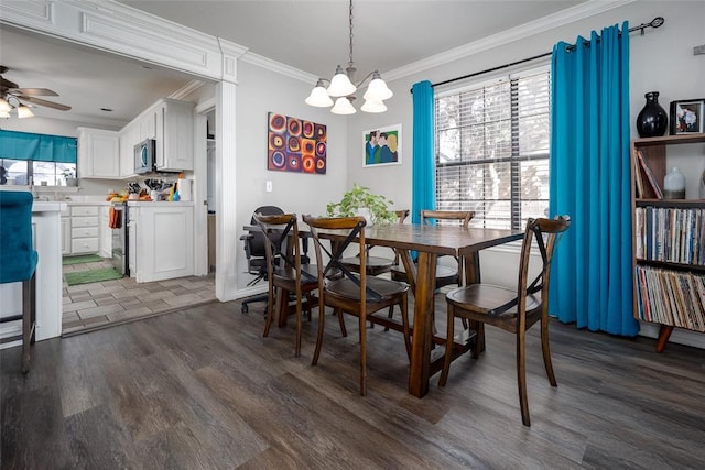 4505 N Peniel Ave, Bethany, OK 73008 - dining space with ornamental molding, dark wood-type flooring, a chandelier, and ceiling fan