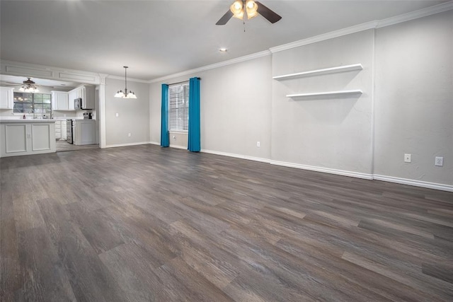 4505 N Peniel Ave, Bethany, OK 73008 - unfurnished living room featuring ceiling fan, dark wood-type flooring, ornamental molding, and a chandelier