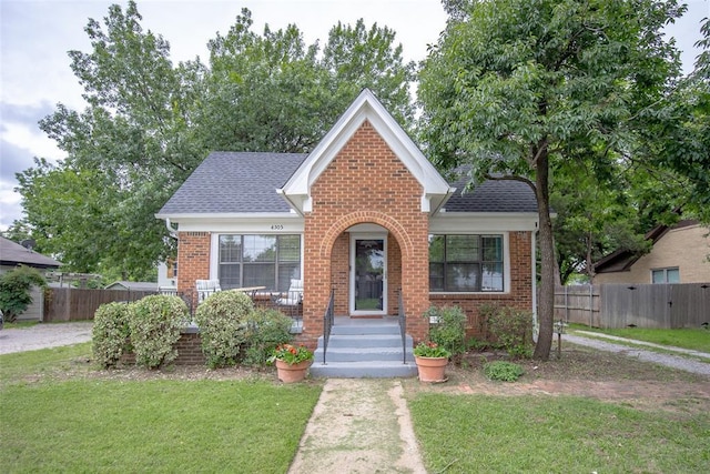 4505 N Peniel Ave, Bethany, OK 73008 - view of front of home with brick siding and roof with shingles