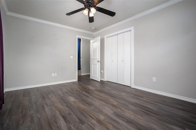 4505 N Peniel Ave, Bethany, OK 73008 - unfurnished bedroom with dark wood-style flooring, ornamental molding, a closet, and ceiling fan