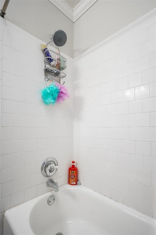 4505 N Peniel Ave, Bethany, OK 73008 - bathroom with shower / bath combination and ornamental molding