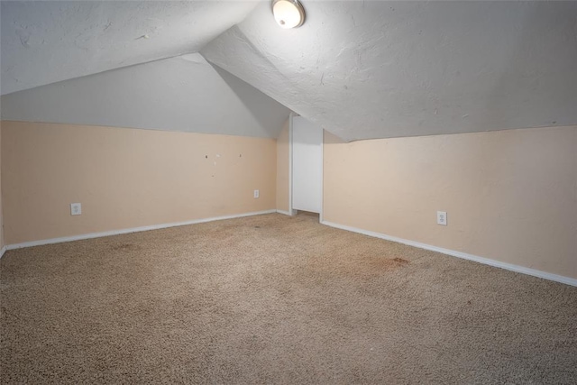 4505 N Peniel Ave, Bethany, OK 73008 - bonus room featuring vaulted ceiling and carpet flooring