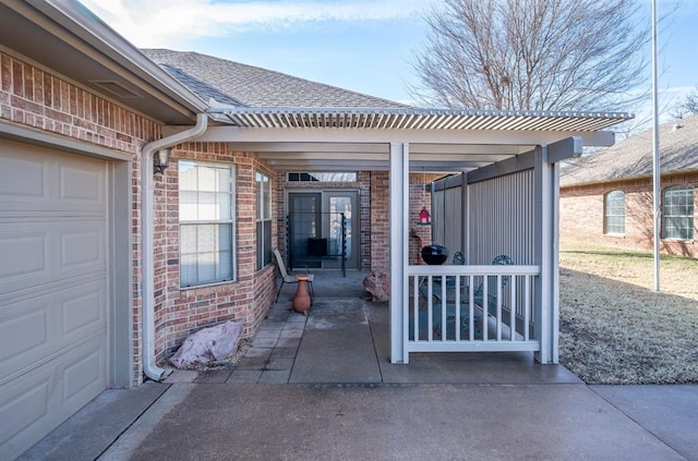 view of patio featuring a garage