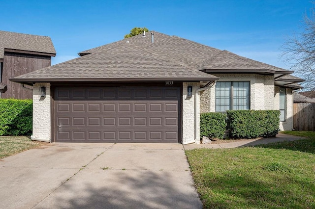 3833 Ives Way, Norman, OK 73072 - view of front of property featuring an attached garage, concrete driveway, a shingled roof, and a front lawn