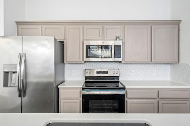 3833 Ives Way, Norman, OK 73072 - kitchen featuring appliances with stainless steel finishes, gray cabinets, and light countertops