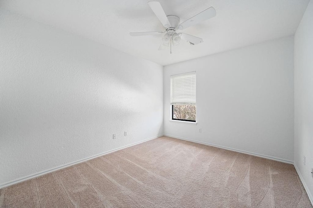 3833 Ives Way, Norman, OK 73072 - empty room featuring carpet flooring, a ceiling fan, and baseboards