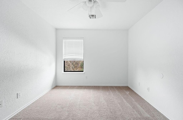 3833 Ives Way, Norman, OK 73072 - carpeted spare room featuring ceiling fan, baseboards, and a textured wall