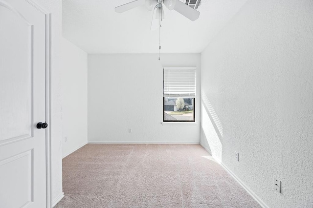 3833 Ives Way, Norman, OK 73072 - carpeted spare room featuring ceiling fan, baseboards, and a textured wall