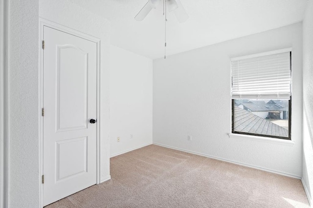 3833 Ives Way, Norman, OK 73072 - carpeted spare room with ceiling fan and baseboards