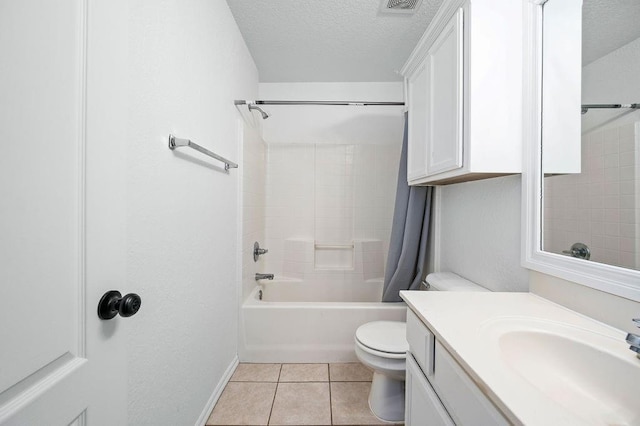 3833 Ives Way, Norman, OK 73072 - bathroom featuring a textured ceiling, toilet, tile patterned flooring, vanity, and shower / bath combination with curtain
