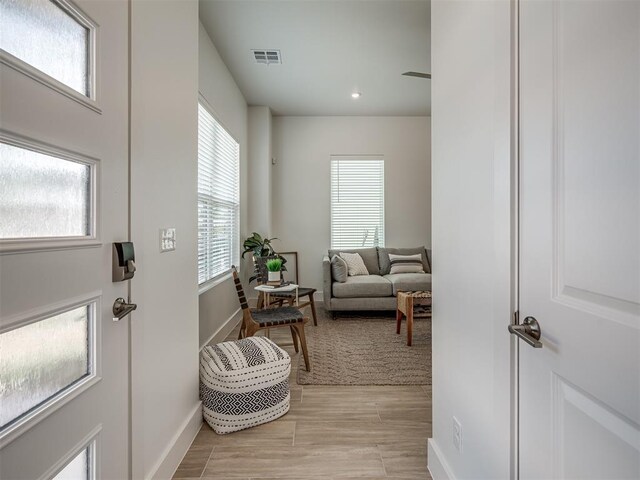 13112 Maplewood Ave, Oklahoma City, OK 73120 - foyer entrance with baseboards, light wood-type flooring, and recessed lighting