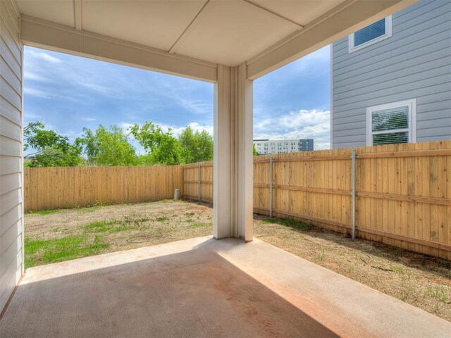 13112 Maplewood Ave, Oklahoma City, OK 73120 - fenced backyard with a patio