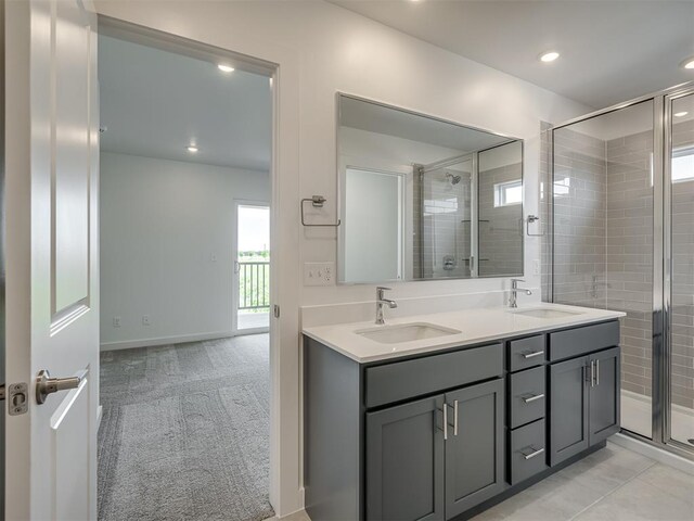 13112 Maplewood Ave, Oklahoma City, OK 73120 - full bathroom featuring plenty of natural light, a stall shower, double vanity, and recessed lighting