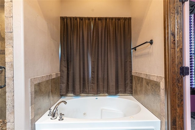 full bathroom featuring a bath