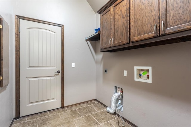 laundry area featuring hookup for a washing machine, hookup for an electric dryer, cabinet space, and baseboards