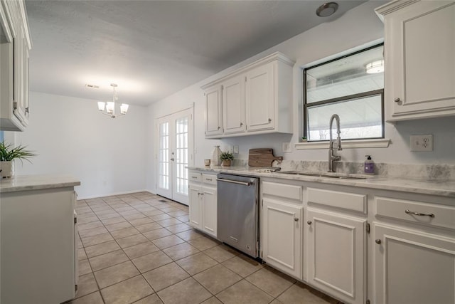 2408 Cypress Ct, Edmond, OK 73013 - kitchen with stainless steel dishwasher, a sink, light tile patterned flooring, white cabinetry, and a chandelier