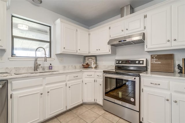 2408 Cypress Ct, Edmond, OK 73013 - kitchen with appliances with stainless steel finishes, a sink, extractor fan, white cabinetry, and light tile patterned floors
