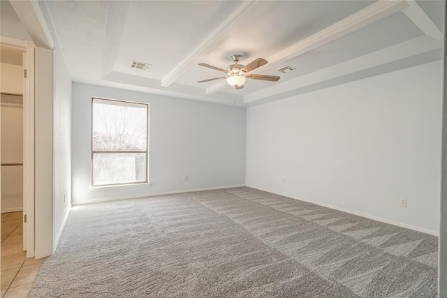 2408 Cypress Ct, Edmond, OK 73013 - spare room with a raised ceiling, light carpet, a ceiling fan, and baseboards