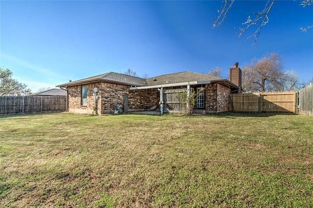 2408 Cypress Ct, Edmond, OK 73013 - back of house with brick siding and a chimney