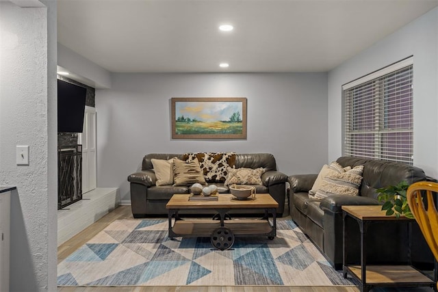 living room featuring recessed lighting and light wood finished floors