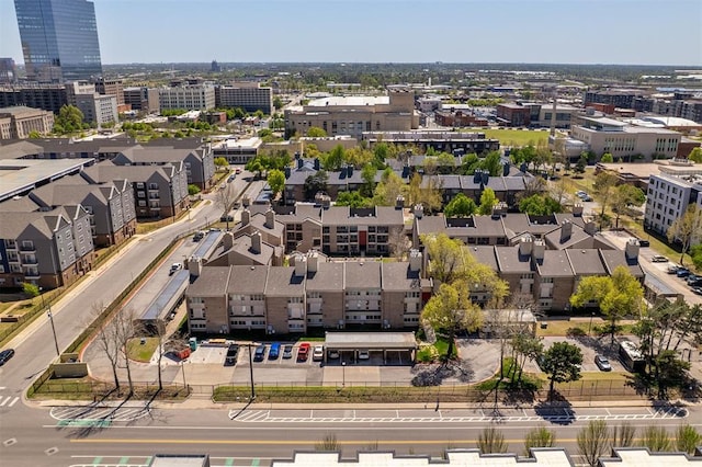 birds eye view of property featuring a view of city