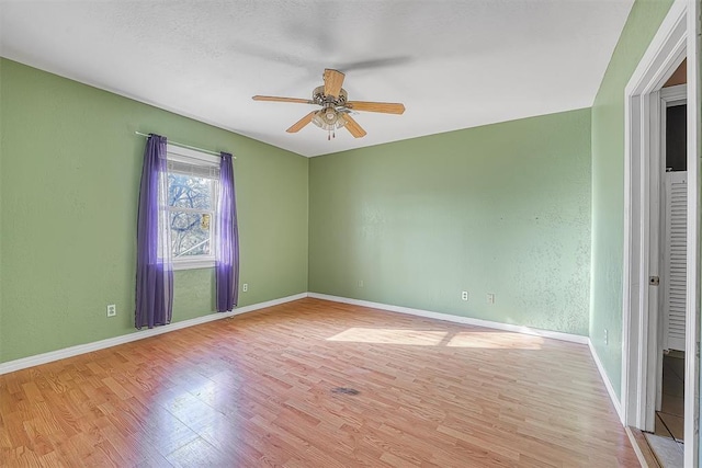 17421 E 1160th Rd, Sweetwater, OK 73666 - spare room featuring baseboards, light wood-type flooring, and ceiling fan