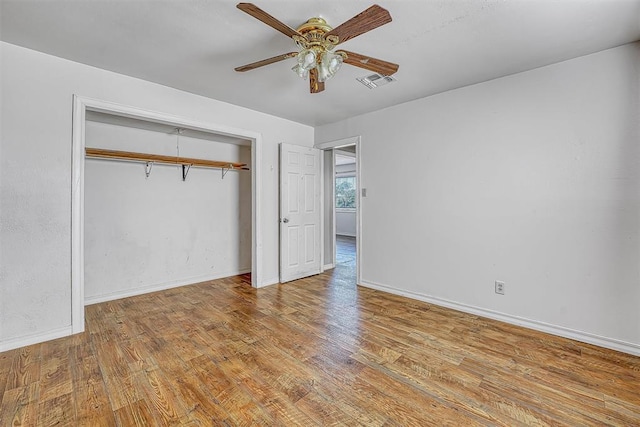 17421 E 1160th Rd, Sweetwater, OK 73666 - unfurnished bedroom with a closet, visible vents, baseboards, and wood finished floors