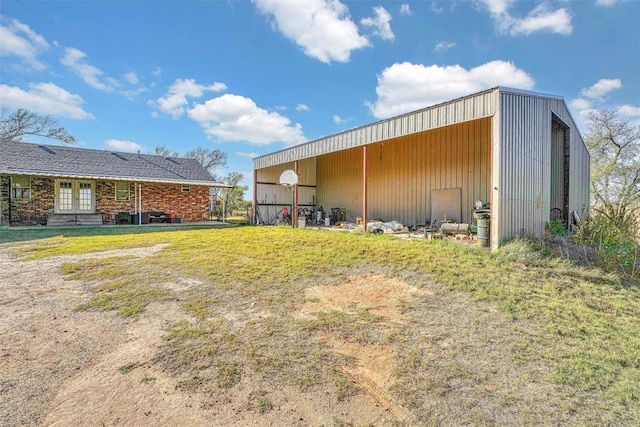 17421 E 1160th Rd, Sweetwater, OK 73666 - exterior space with french doors and a lawn