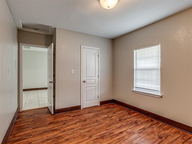 3604 NW 27th St, Oklahoma City, OK 73107 - empty room featuring wood finished floors and baseboards
