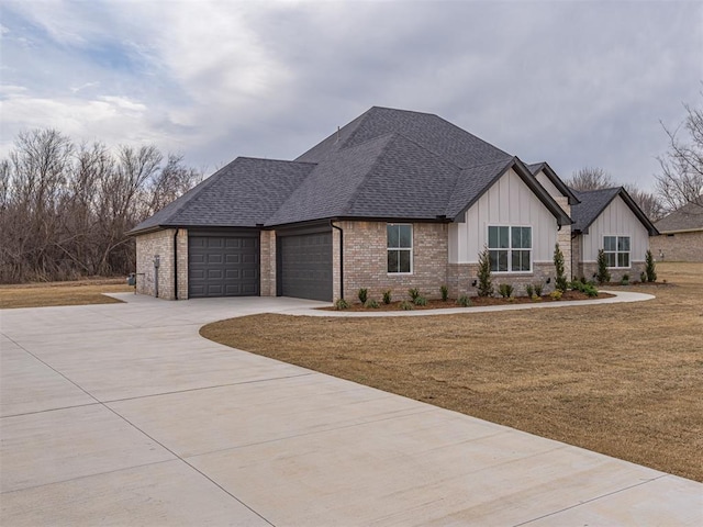 2292 NW 34th St, Newcastle, OK 73065 - view of front of house with board and batten siding, a shingled roof, a front lawn, a garage, and brick siding