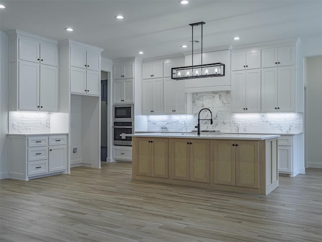 2292 NW 34th St, Newcastle, OK 73065 - kitchen featuring stainless steel oven, built in microwave, light wood-style flooring, tasteful backsplash, and light countertops