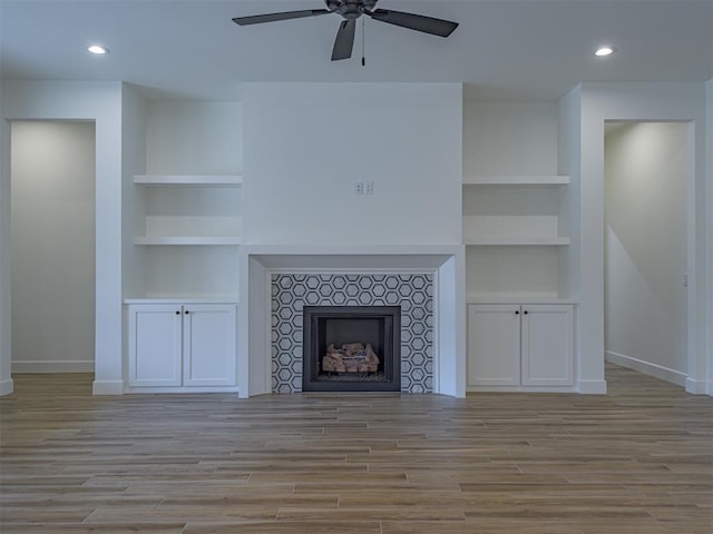 2292 NW 34th St, Newcastle, OK 73065 - unfurnished living room with baseboards, ceiling fan, wood finished floors, and recessed lighting
