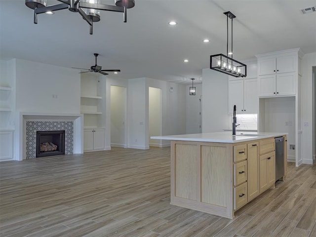 2292 NW 34th St, Newcastle, OK 73065 - kitchen with a chandelier, a sink, baseboards, dishwasher, and recessed lighting