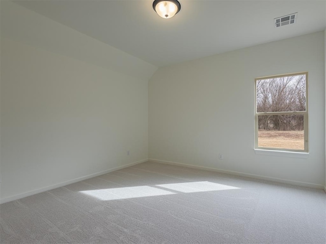 2292 NW 34th St, Newcastle, OK 73065 - unfurnished room featuring light carpet, baseboards, and vaulted ceiling