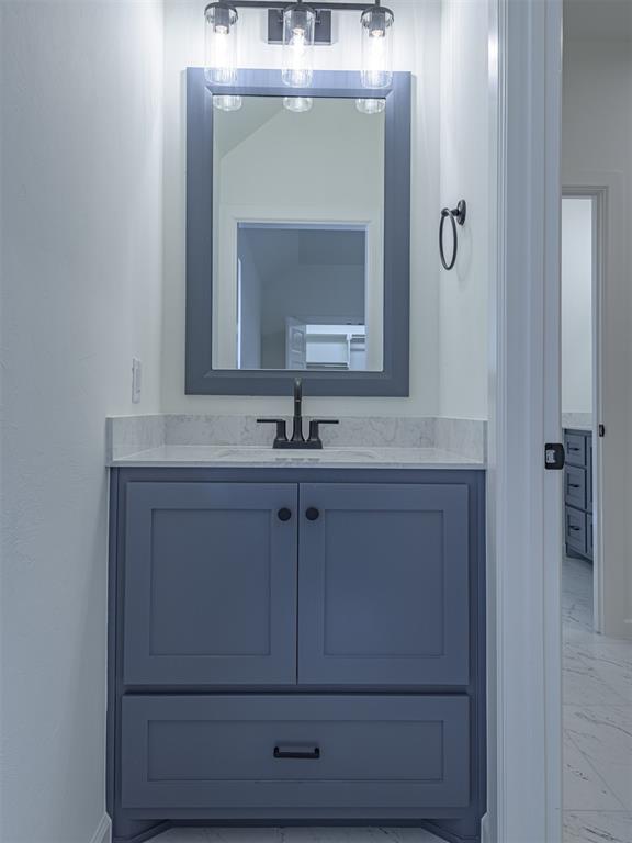 2292 NW 34th St, Newcastle, OK 73065 - bathroom with marble finish floors and vanity
