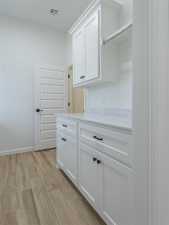 2292 NW 34th St, Newcastle, OK 73065 - washroom featuring light wood-type flooring and baseboards