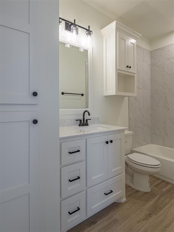 2292 NW 34th St, Newcastle, OK 73065 - bathroom featuring vanity, wood finished floors, and toilet