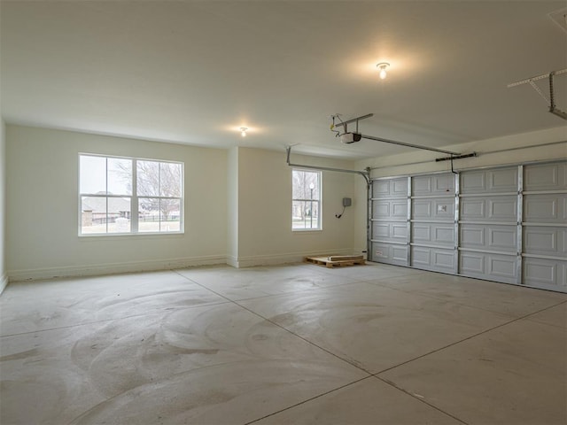 2292 NW 34th St, Newcastle, OK 73065 - garage with a garage door opener and baseboards