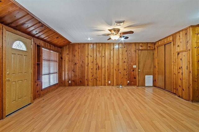 interior space featuring a wealth of natural light, visible vents, light wood-style flooring, and ceiling fan