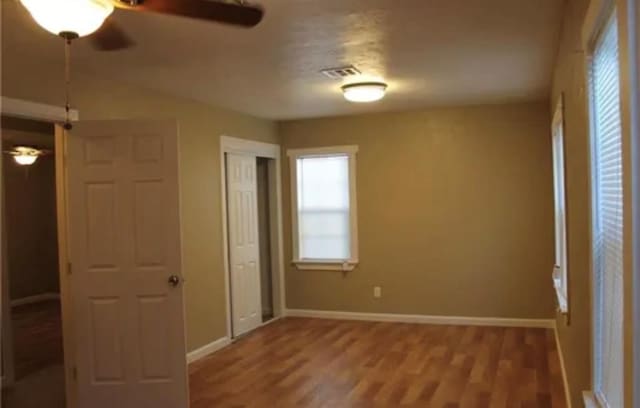 2941 SW 48th St, Oklahoma City, OK 73119 - unfurnished bedroom with visible vents, baseboards, and light wood-style floors