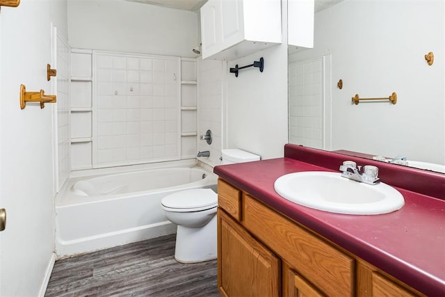 full bath featuring vanity, toilet, shower / bathtub combination, and wood finished floors
