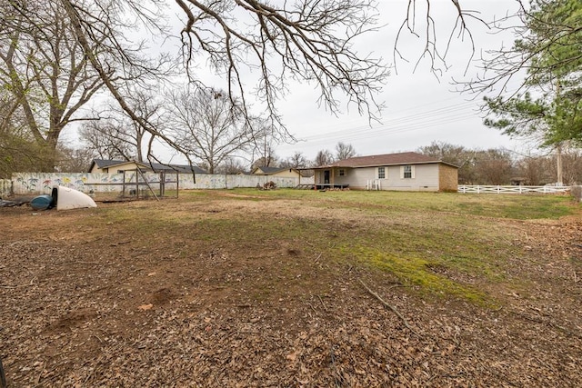 view of yard featuring fence