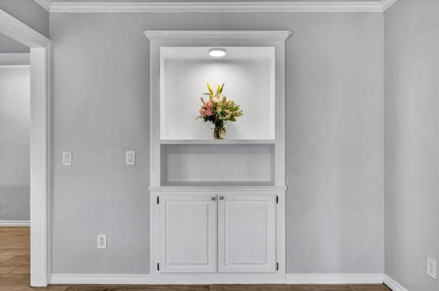 2008 Powderhorn, Edmond, OK 73034 - hall featuring baseboards, wood finished floors, and crown molding
