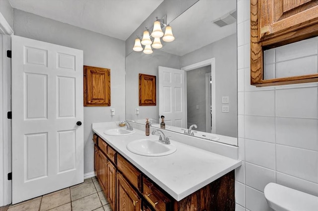 2008 Powderhorn, Edmond, OK 73034 - bathroom with a sink, visible vents, toilet, and double vanity