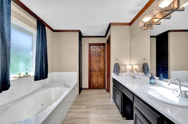 2008 Powderhorn, Edmond, OK 73034 - bathroom with double vanity, ornamental molding, a jetted tub, and a sink