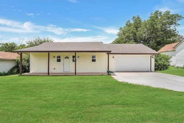 311 N 7th St, Sayre, OK 73662 - ranch-style home featuring a porch, driveway, an attached garage, and a front lawn