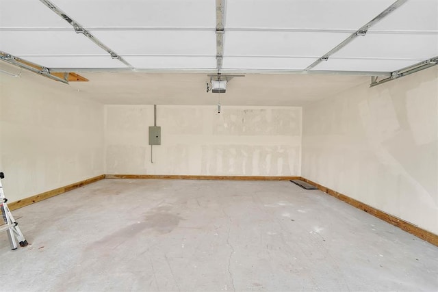 311 N 7th St, Sayre, OK 73662 - garage with a garage door opener and electric panel